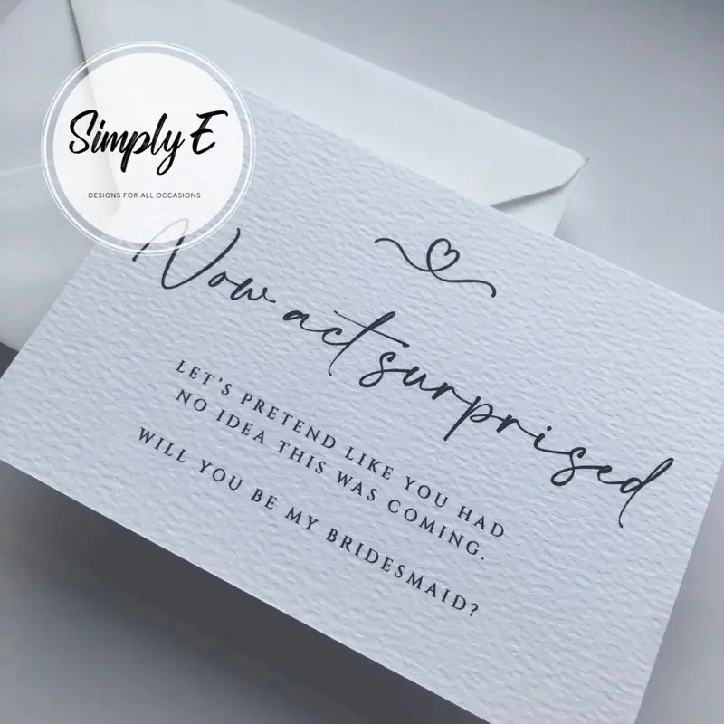 "Now Act Surprised" Bridesmaid Card card by Simply E: Now act surprised. Let's pretend like you had no idea this was coming. Will you be my bridesmaid?